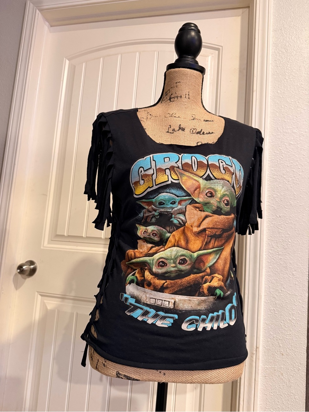Black 'The Child' Graphic womens Fringe Tee